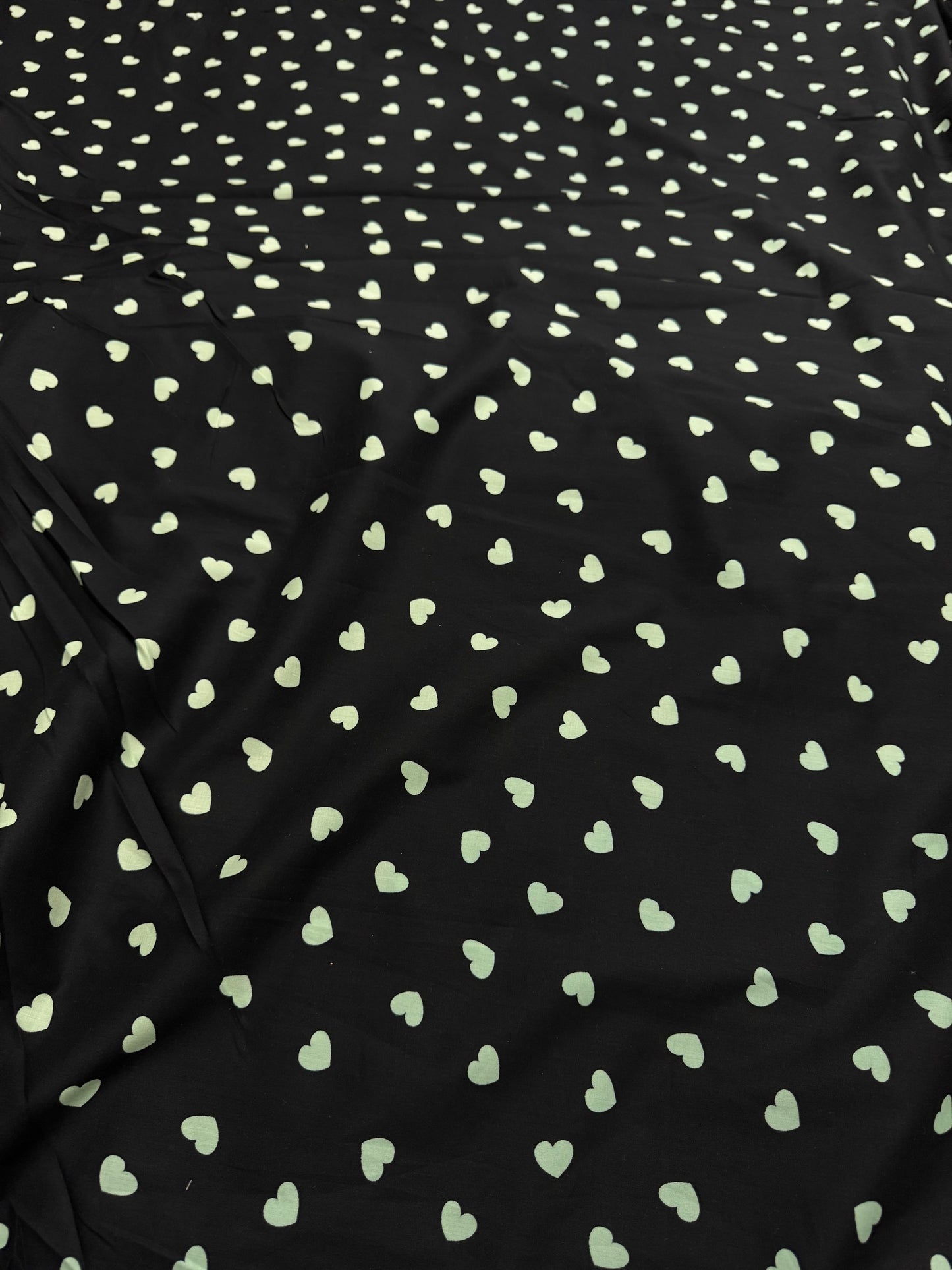 Buy Mul Cotton Black Base Mint Green Heart Printed Fabric