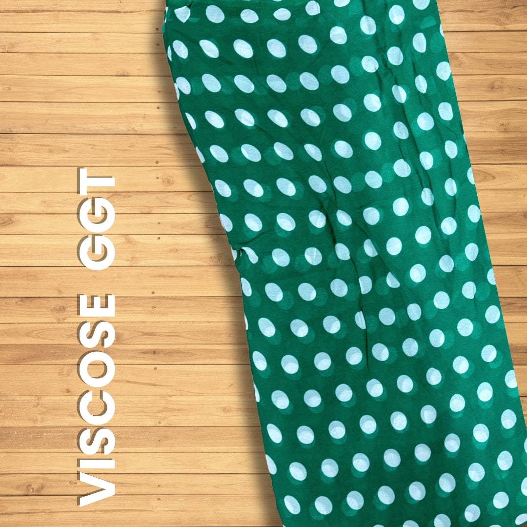 Buy Viscose Georgette Green Polka Dot Fabric