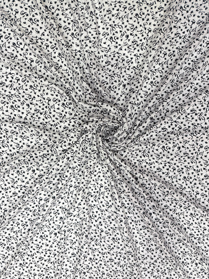 Buy Viscose Modal White Base Numeric Printed Fabric - MAF 