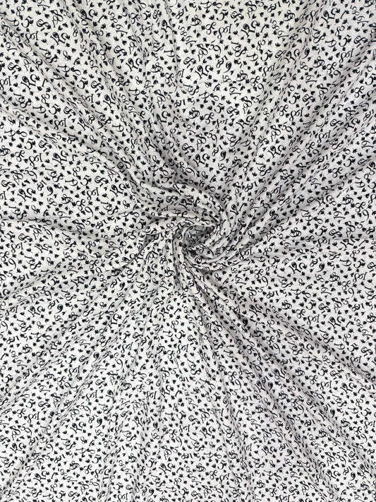 Buy Viscose Modal White Base Numeric Printed Fabric - MAF 