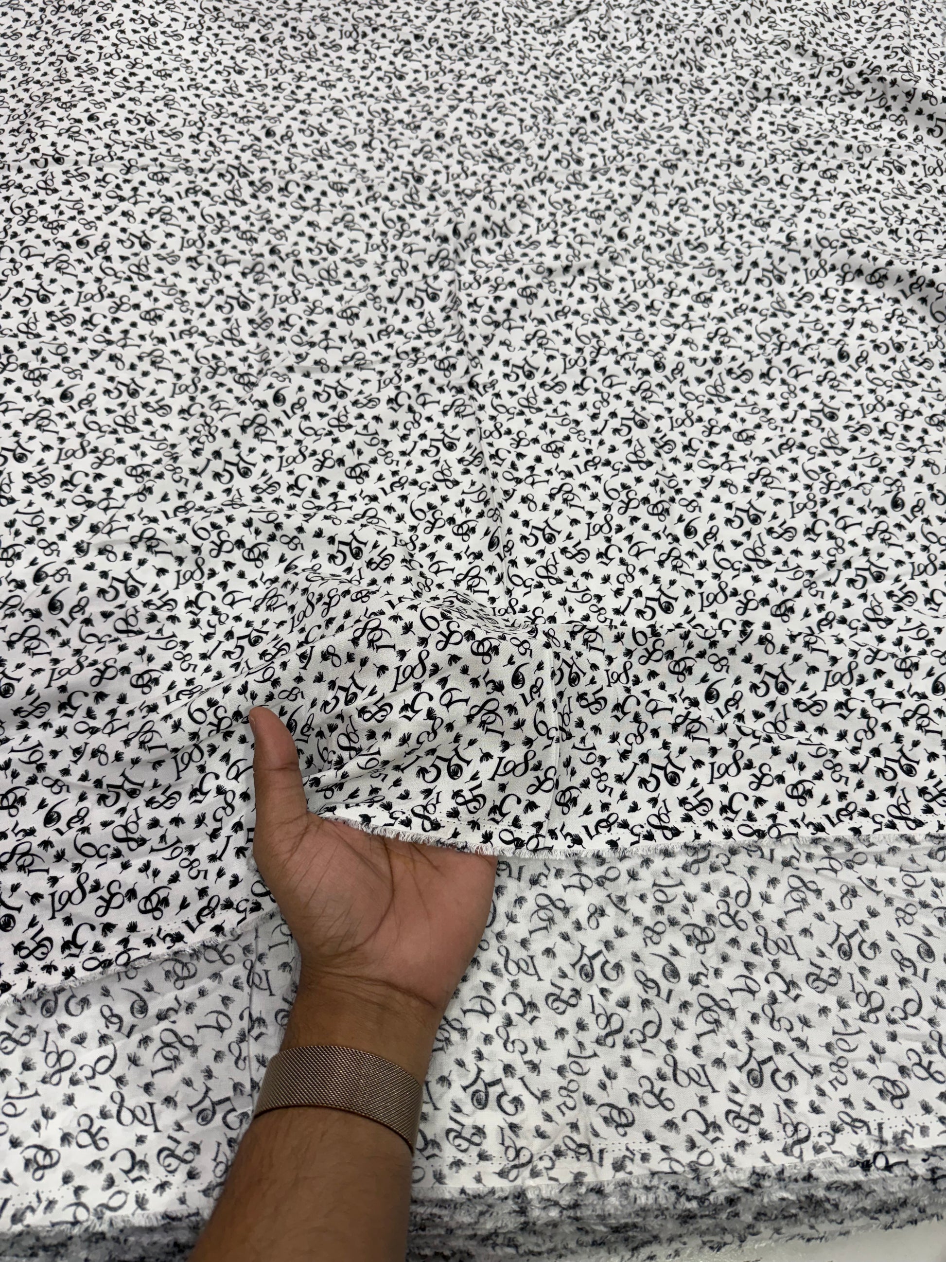 Buy Viscose Modal White Base Numeric Printed Fabric - MAF 