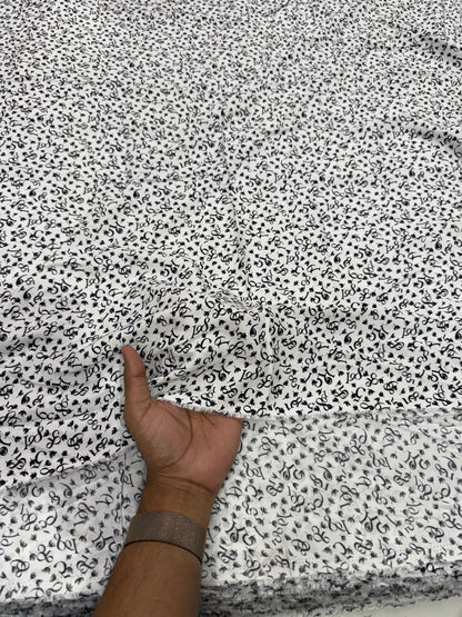 Buy Viscose Modal White Base Numeric Printed Fabric - MAF 