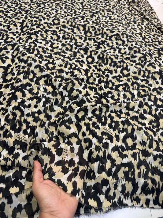 Buy Viscose Chiffon Ivory Base Cheetah Printed Fabric
