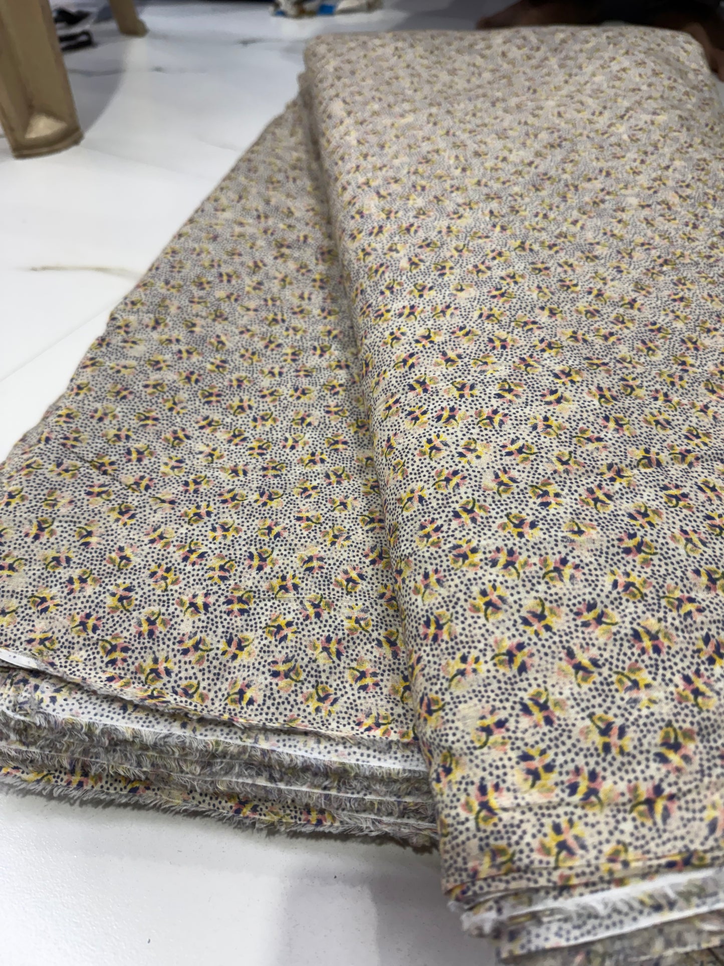 Buy Mul Cotton Butterfly Like Flower Printed Fabric