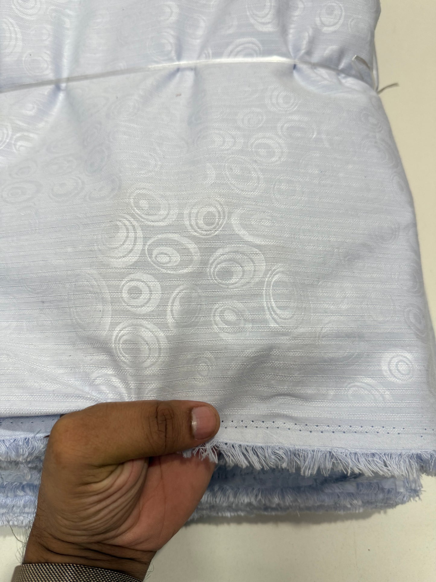 Buy Shirting Poplin Baby Blue Self Dobby Multi Oval Fabric