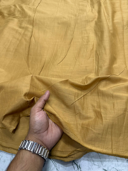 Buy Cambric Slub Solid Mustard Fabric