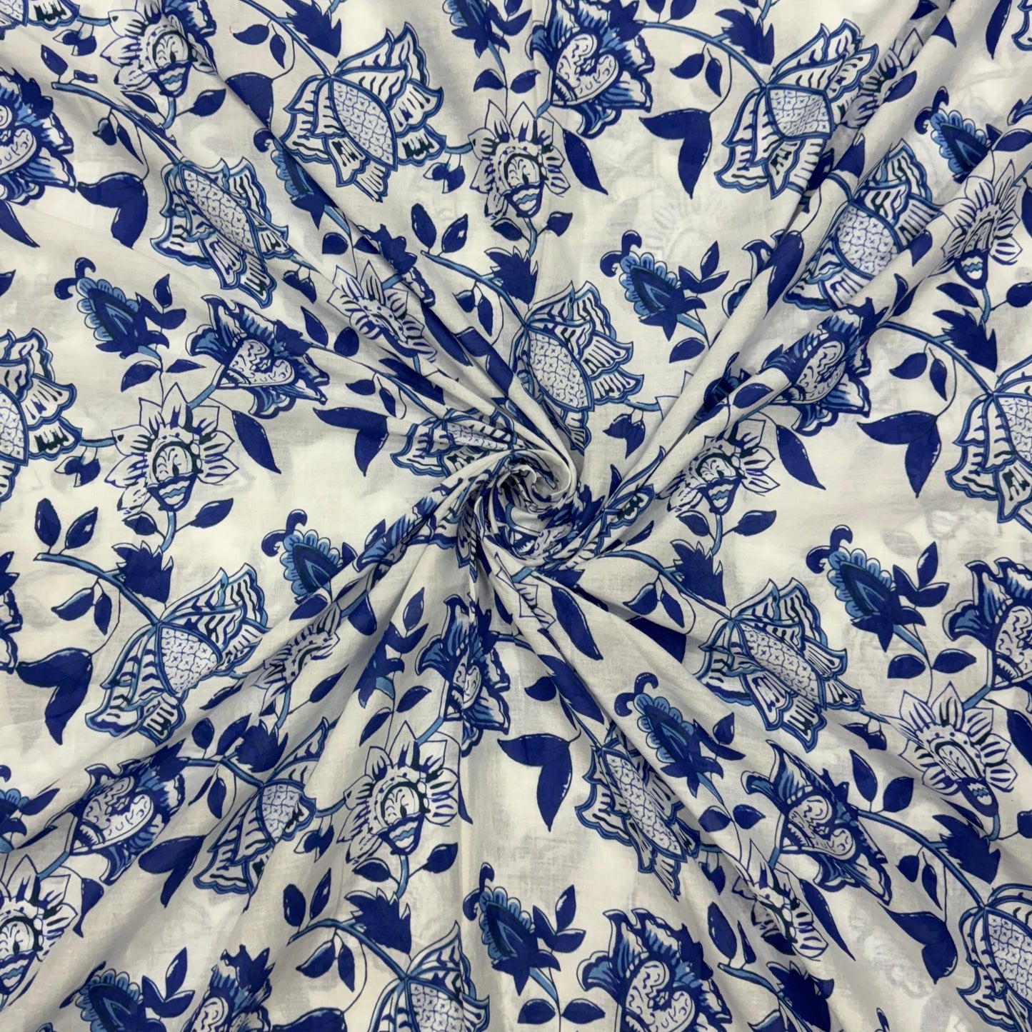 Buy cambric Cotton Blue Shrub Printed Fabric