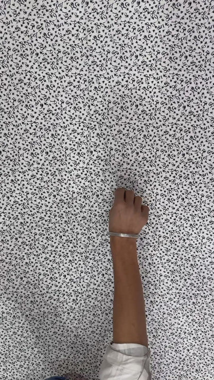 Buy Viscose Modal White Base Numeric Printed Fabric
