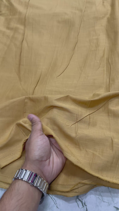 Buy Cambric Slub Solid Mustard Fabric