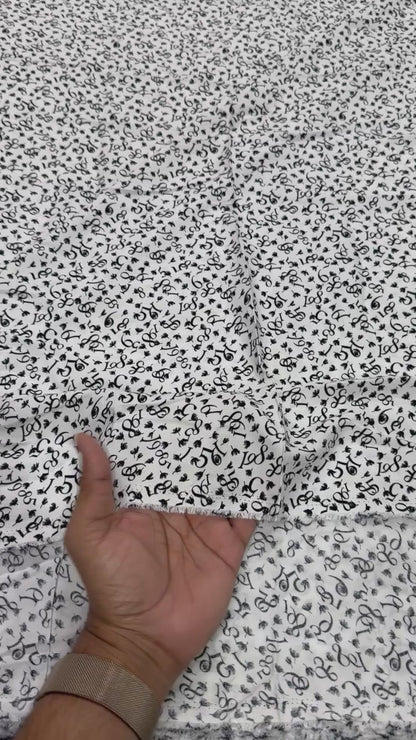 Buy Viscose Modal White Base Numeric Printed Fabric